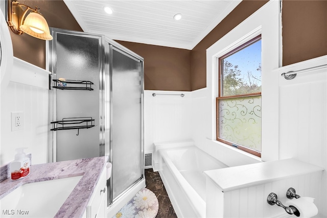 26561 Butternut Ridge Rd, North Olmsted, OH 44070 - full bath with marble tiled floors, a stall shower, a sink, recessed lighting, and a garden tub