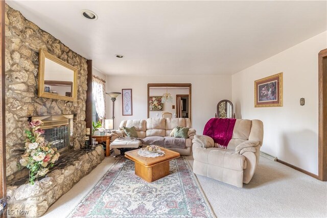 73 Hemlock Ln, Weirton, WV 26062 - carpeted living area with a fireplace and baseboards