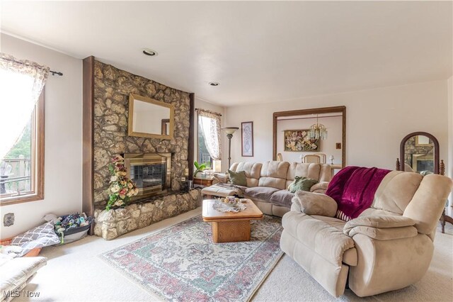 73 Hemlock Ln, Weirton, WV 26062 - carpeted living room with a fireplace
