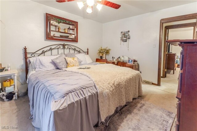 73 Hemlock Ln, Weirton, WV 26062 - bedroom with light colored carpet and a ceiling fan