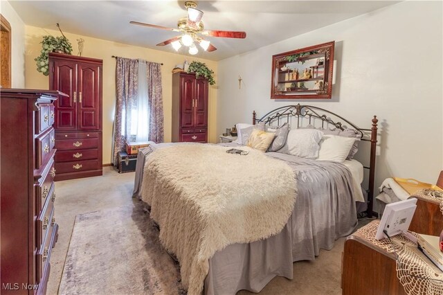 73 Hemlock Ln, Weirton, WV 26062 - bedroom featuring light colored carpet and ceiling fan