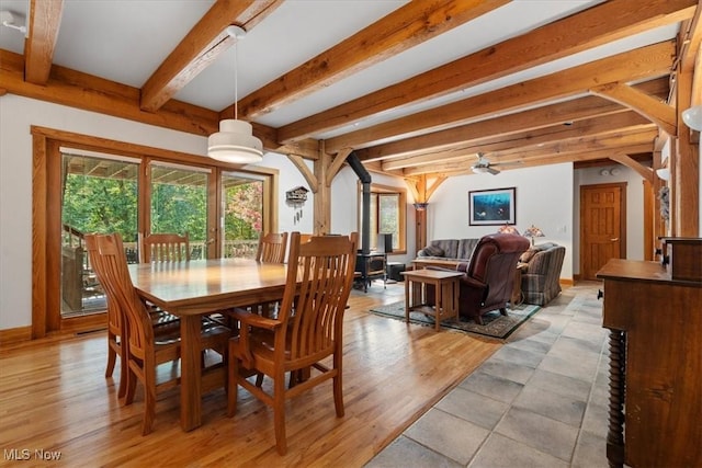 70 Northlake Ct, Vincent, OH 45784 - dining space with healthy amount of natural light, beam ceiling, baseboards, and light wood finished floors