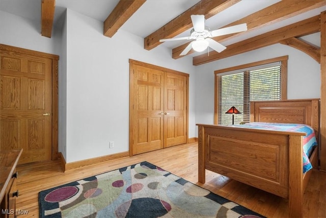 70 Northlake Ct, Vincent, OH 45784 - bedroom with wood finished floors, baseboards, beamed ceiling, and a ceiling fan