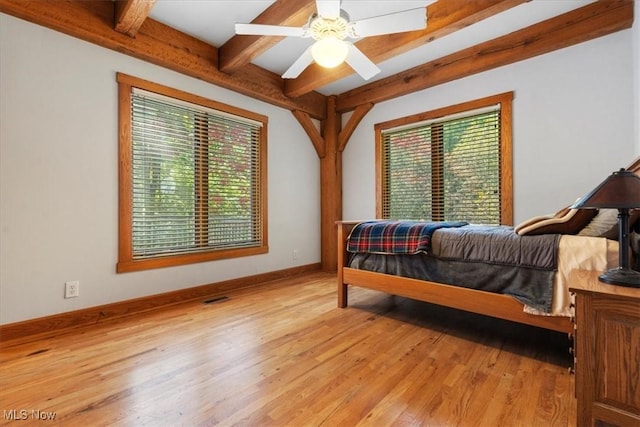 70 Northlake Ct, Vincent, OH 45784 - bedroom featuring beam ceiling, light wood-style flooring, baseboards, and a ceiling fan