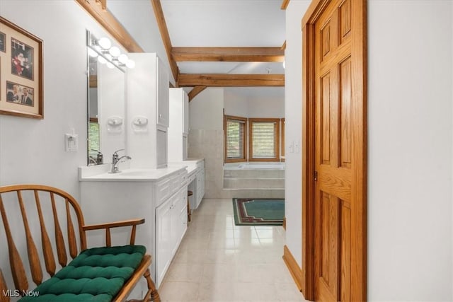 70 Northlake Ct, Vincent, OH 45784 - bathroom with plenty of natural light, tile patterned flooring, a garden tub, vanity, and beam ceiling