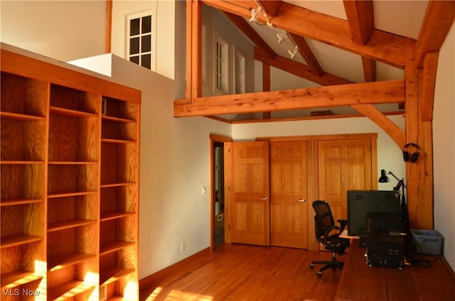 70 Northlake Ct, Vincent, OH 45784 - office featuring wood finished floors, beamed ceiling, high vaulted ceiling, and baseboards