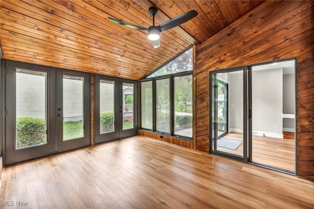 unfurnished sunroom featuring french doors and lofted ceiling