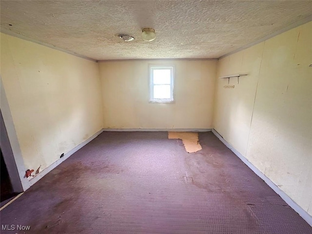 4308 Flat Rd SE, Uhrichsville, OH 44683 - unfurnished room featuring a textured ceiling and carpet floors