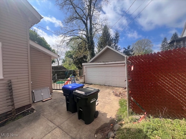 detached garage with fence