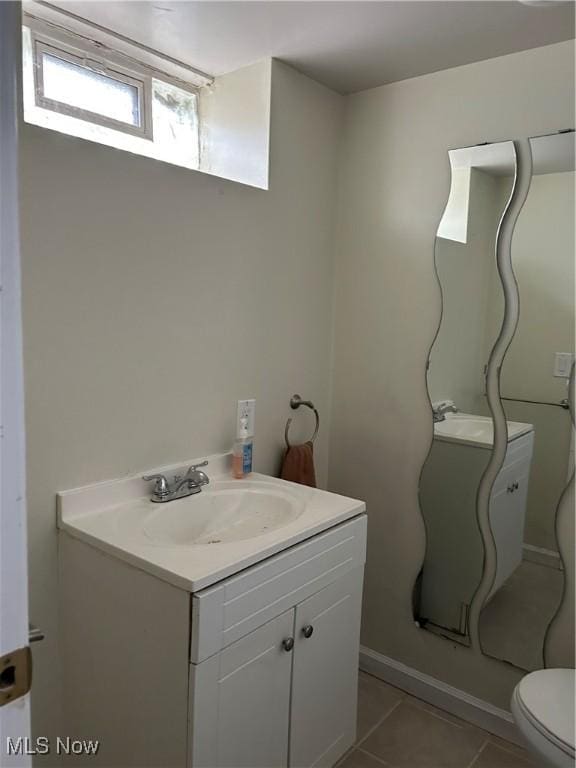 4514 E Berwald, South Euclid, OH 44121 - half bath with toilet, vanity, and tile patterned flooring