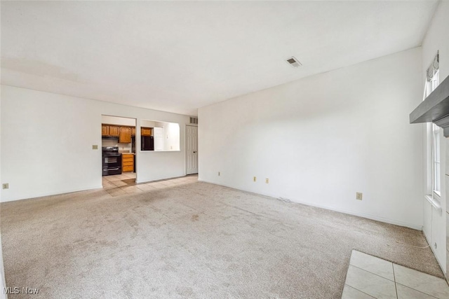 1328 Cedarwood Dr Unit A3, Westlake, OH 44145 - unfurnished living room with light carpet