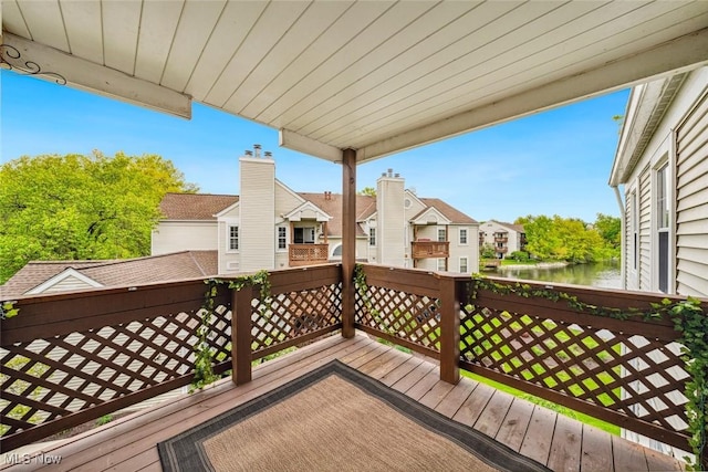 1328 Cedarwood Dr Unit A3, Westlake, OH 44145 - deck featuring a residential view and a water view