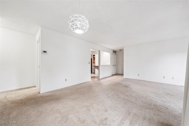 1328 Cedarwood Dr Unit A3, Westlake, OH 44145 - unfurnished living room featuring light colored carpet
