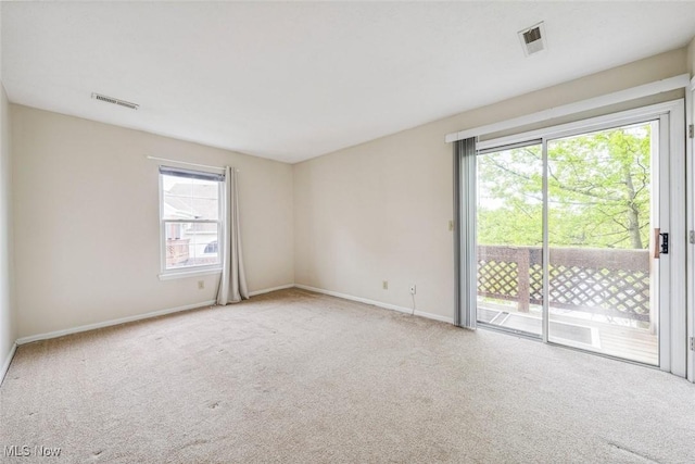 1328 Cedarwood Dr Unit A3, Westlake, OH 44145 - carpeted empty room with healthy amount of natural light and baseboards