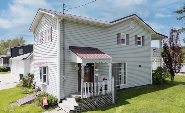170 Upper Eureka Rd, Belmont, WV 26134 - view of front of house featuring a front yard, metal roof, and concrete driveway
