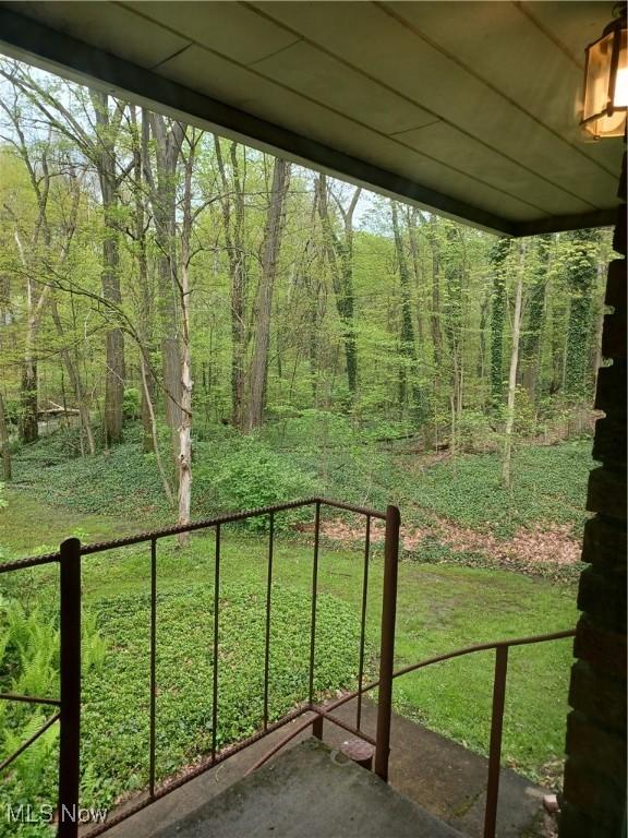 1050 Park Cir, Girard, OH 44420 - balcony featuring a view of trees