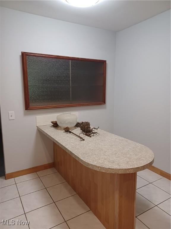 1050 Park Cir, Girard, OH 44420 - bathroom featuring baseboards and tile patterned floors