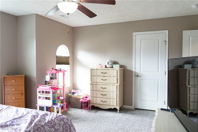 3576 Jude Cir, Reminderville, OH 44087 - carpeted bedroom with a ceiling fan and a textured ceiling