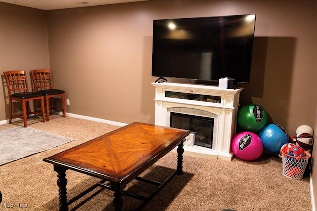 3576 Jude Cir, Reminderville, OH 44087 - carpeted living area with a high end fireplace and baseboards