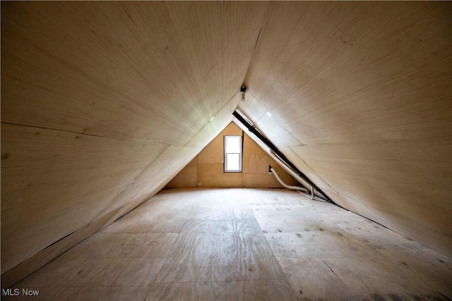 bonus room featuring lofted ceiling