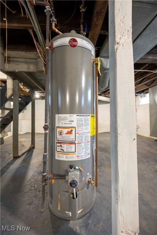 utility room featuring gas water heater