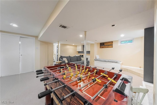 recreation room with recessed lighting
