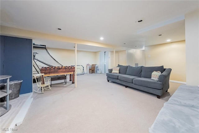 living area featuring carpet flooring and recessed lighting