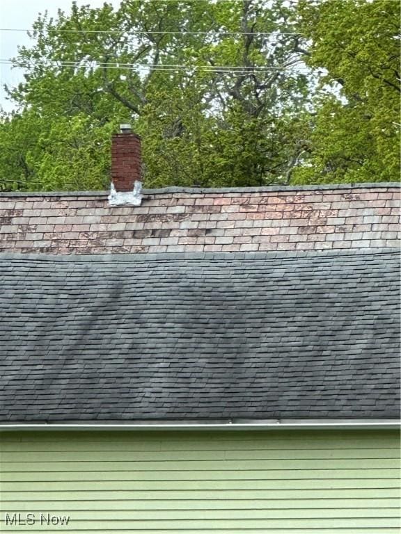 exterior view of a chimney and a high end roof