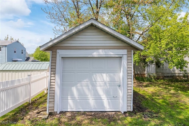 detached garage with fence