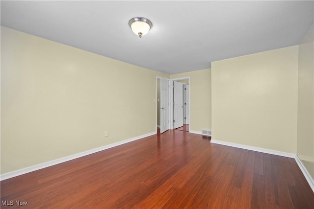 5550 Barton Rd, North Olmsted, OH 44070 - empty room with baseboards and wood finished floors