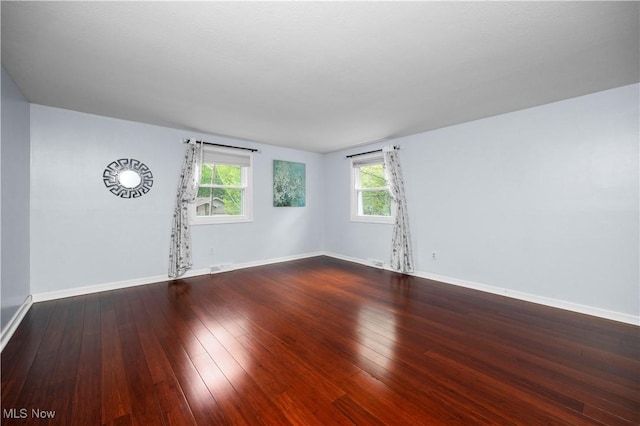 5550 Barton Rd, North Olmsted, OH 44070 - empty room with baseboards and hardwood / wood-style flooring