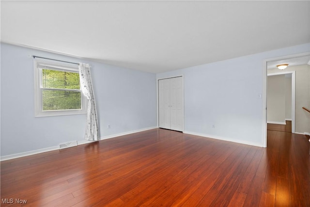 5550 Barton Rd, North Olmsted, OH 44070 - spare room with wood-type flooring and baseboards