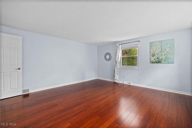 5550 Barton Rd, North Olmsted, OH 44070 - unfurnished room featuring dark wood-type flooring and baseboards