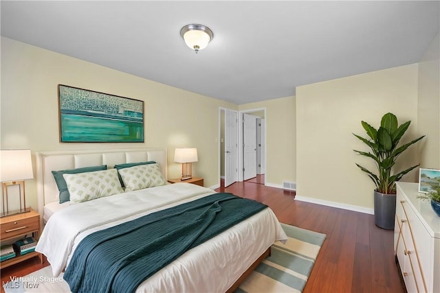 5550 Barton Rd, North Olmsted, OH 44070 - bedroom featuring baseboards and wood finished floors