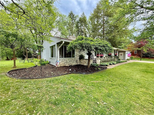 45 Meadowcrest Dr, Parkersburg, WV 26104 - view of property exterior with a lawn and stone siding
