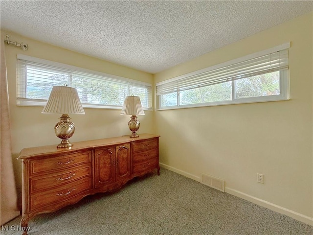 45 Meadowcrest Dr, Parkersburg, WV 26104 - living area with a textured ceiling, light carpet, and baseboards