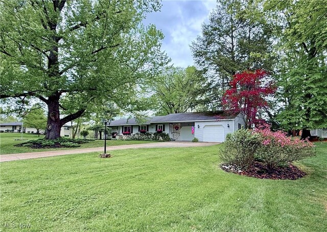 45 Meadowcrest Dr, Parkersburg, WV 26104 - ranch-style house featuring an attached garage, asphalt driveway, and a front lawn