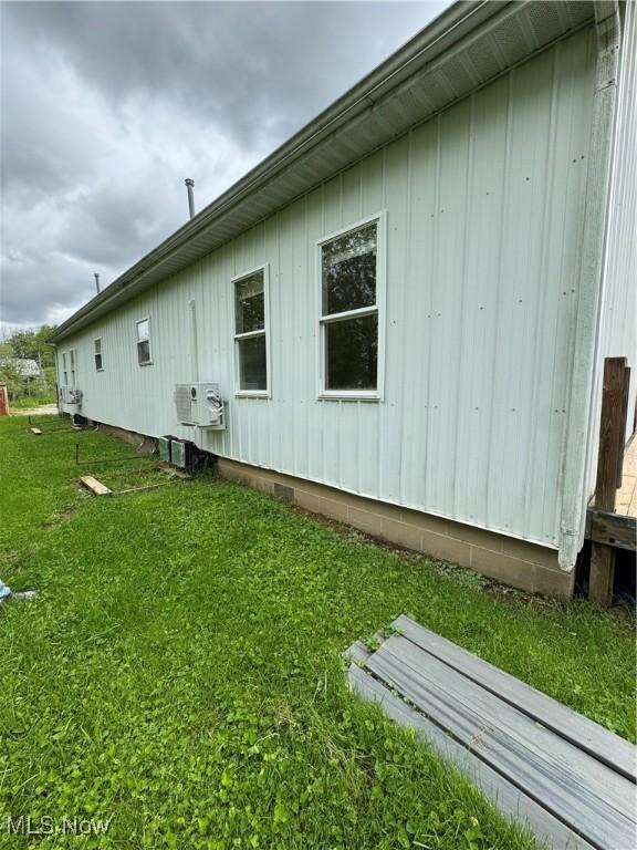 10270 State Route 550, Vincent, OH 45784 - view of side of property featuring a yard and board and batten siding