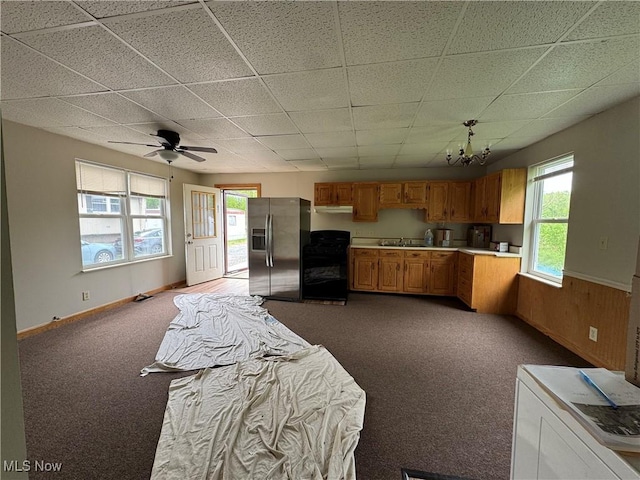 10270 State Route 550, Vincent, OH 45784 - kitchen with stainless steel fridge, light countertops, a paneled ceiling, a ceiling fan, and dark carpet