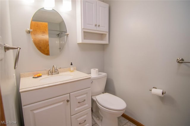 53350 High Ridge Rd, Bridgeport, OH 43912 - bathroom featuring toilet, vanity, and tile patterned flooring