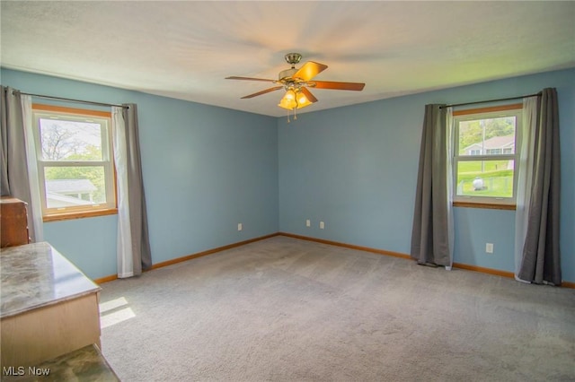 53350 High Ridge Rd, Bridgeport, OH 43912 - spare room with ceiling fan, carpet floors, and baseboards