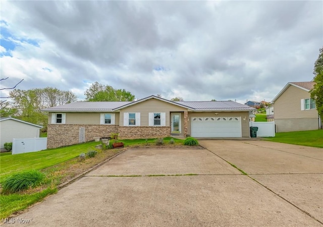 53350 High Ridge Rd, Bridgeport, OH 43912 - ranch-style house with an attached garage, metal roof, driveway, and brick siding