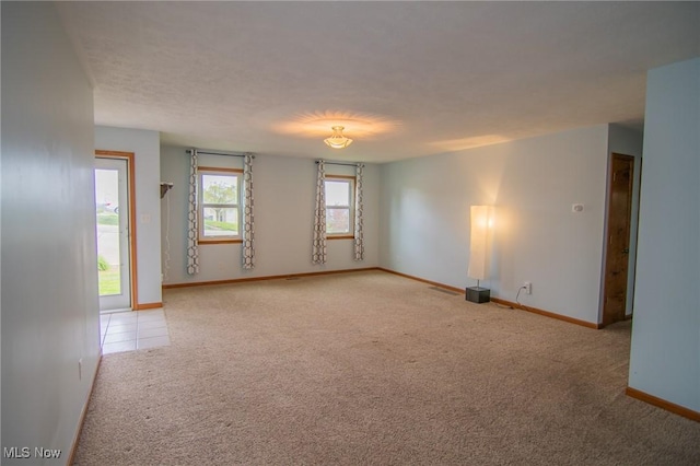53350 High Ridge Rd, Bridgeport, OH 43912 - carpeted empty room with baseboards