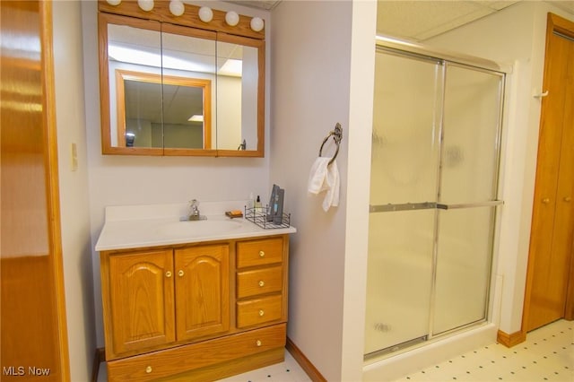 53350 High Ridge Rd, Bridgeport, OH 43912 - full bath featuring a shower stall, vanity, tile patterned floors, and baseboards