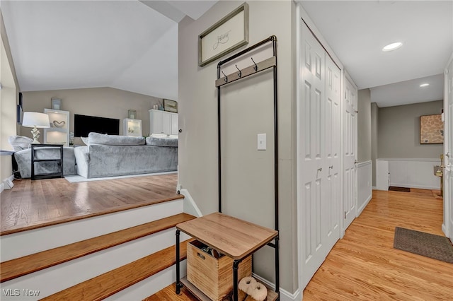 7805 Skylineview Dr, Mentor, OH 44060 - hallway featuring light wood-style floors, recessed lighting, and lofted ceiling