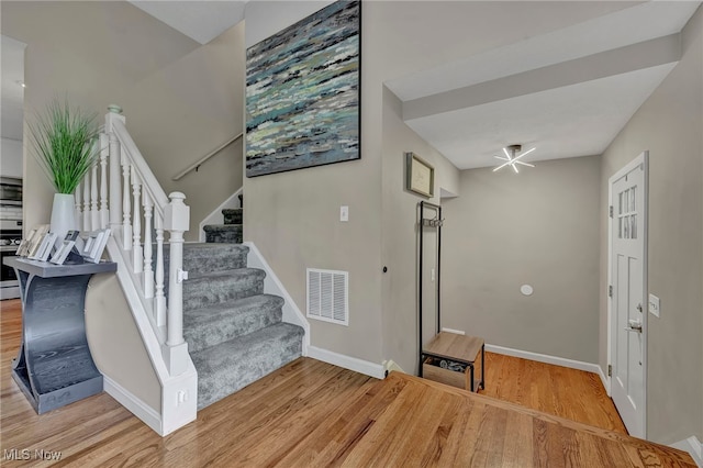7805 Skylineview Dr, Mentor, OH 44060 - stairway with wood finished floors and baseboards