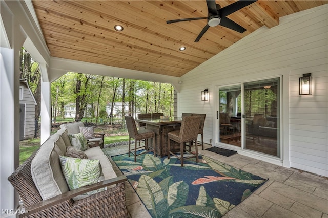 7805 Skylineview Dr, Mentor, OH 44060 - sunroom featuring lofted ceiling, a ceiling fan, outdoor lounge area, and outdoor dining space