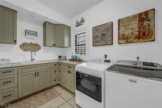 7440 Thatchum Ln, Concord, OH 44077 - laundry area with washer and clothes dryer, cabinet space, and light tile patterned floors