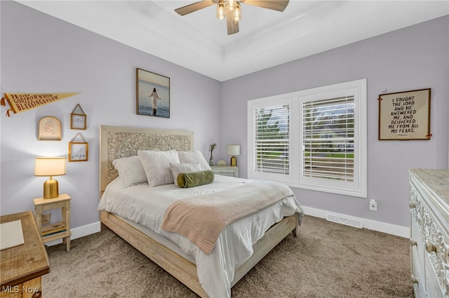 7440 Thatchum Ln, Concord, OH 44077 - carpeted bedroom featuring a tray ceiling, baseboards, crown molding, and ceiling fan