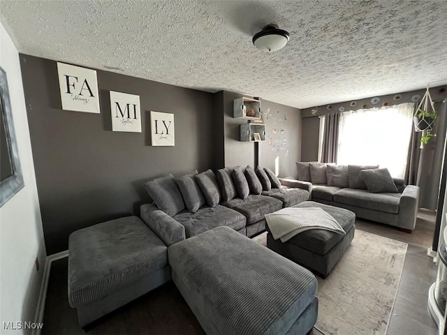 396 Railroad St, Painesville, OH 44077 - living room with a textured ceiling and wood finished floors